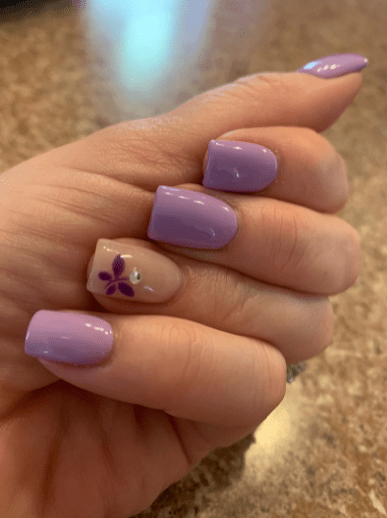 Acrylic manicure with jewel design