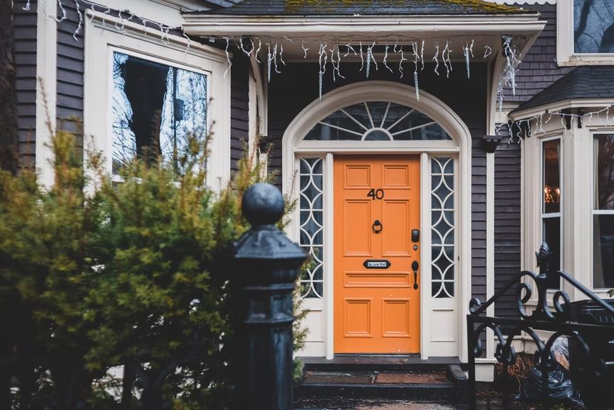 a beautiful door frame with sidelights