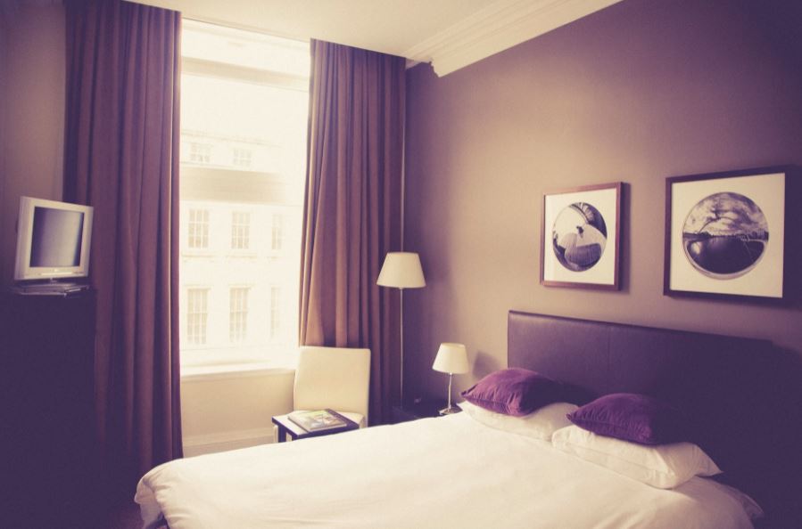 a bedroom with thick curtains