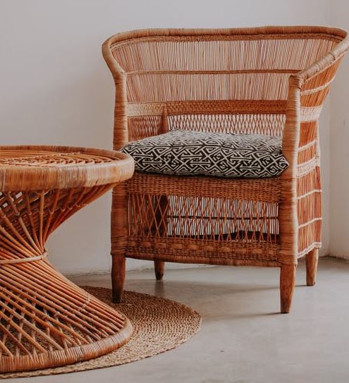 brown wooden framed gray padded armchair