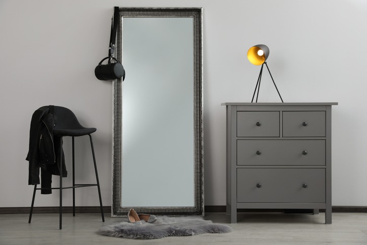 large mirror in a bedroom