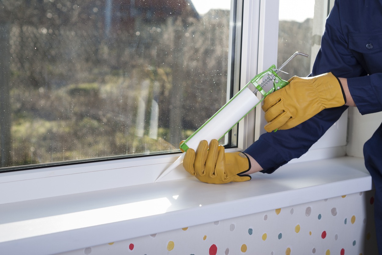 caulking a window frame