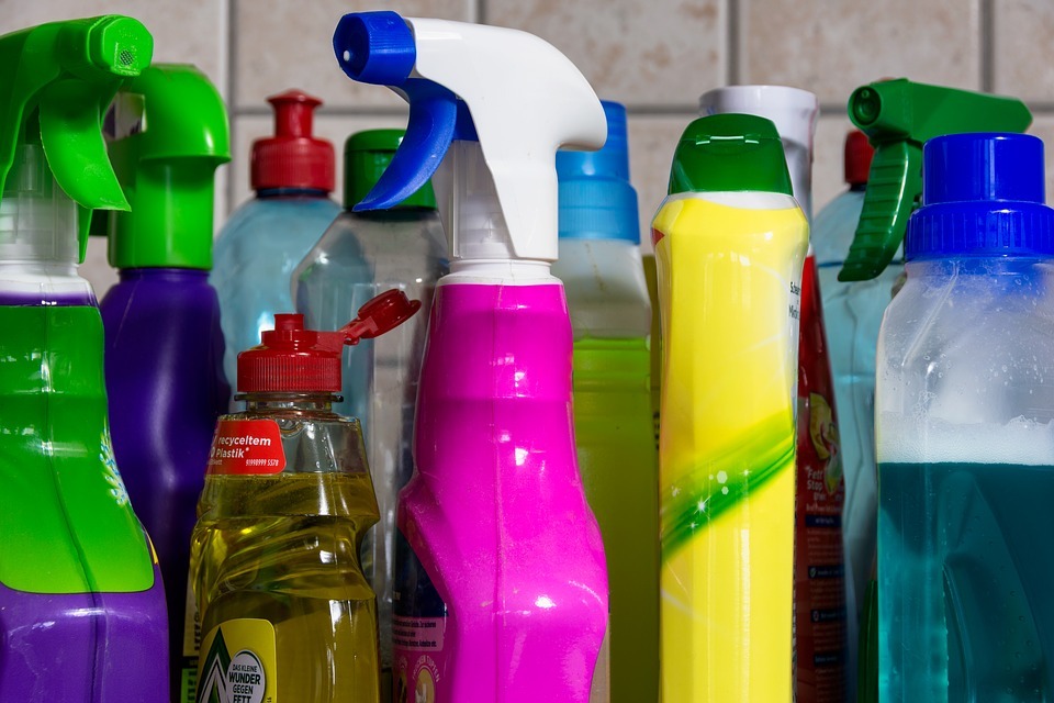 Bottles of cleaning products placed on a countertop together