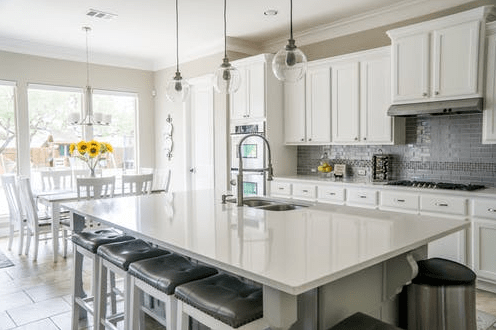 A clean and tidy kitchen in white