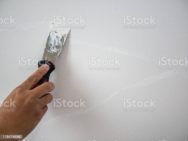 A plaster wall crack repair
