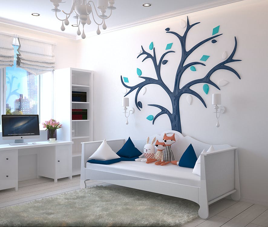 kids' room with a tree wall decoration