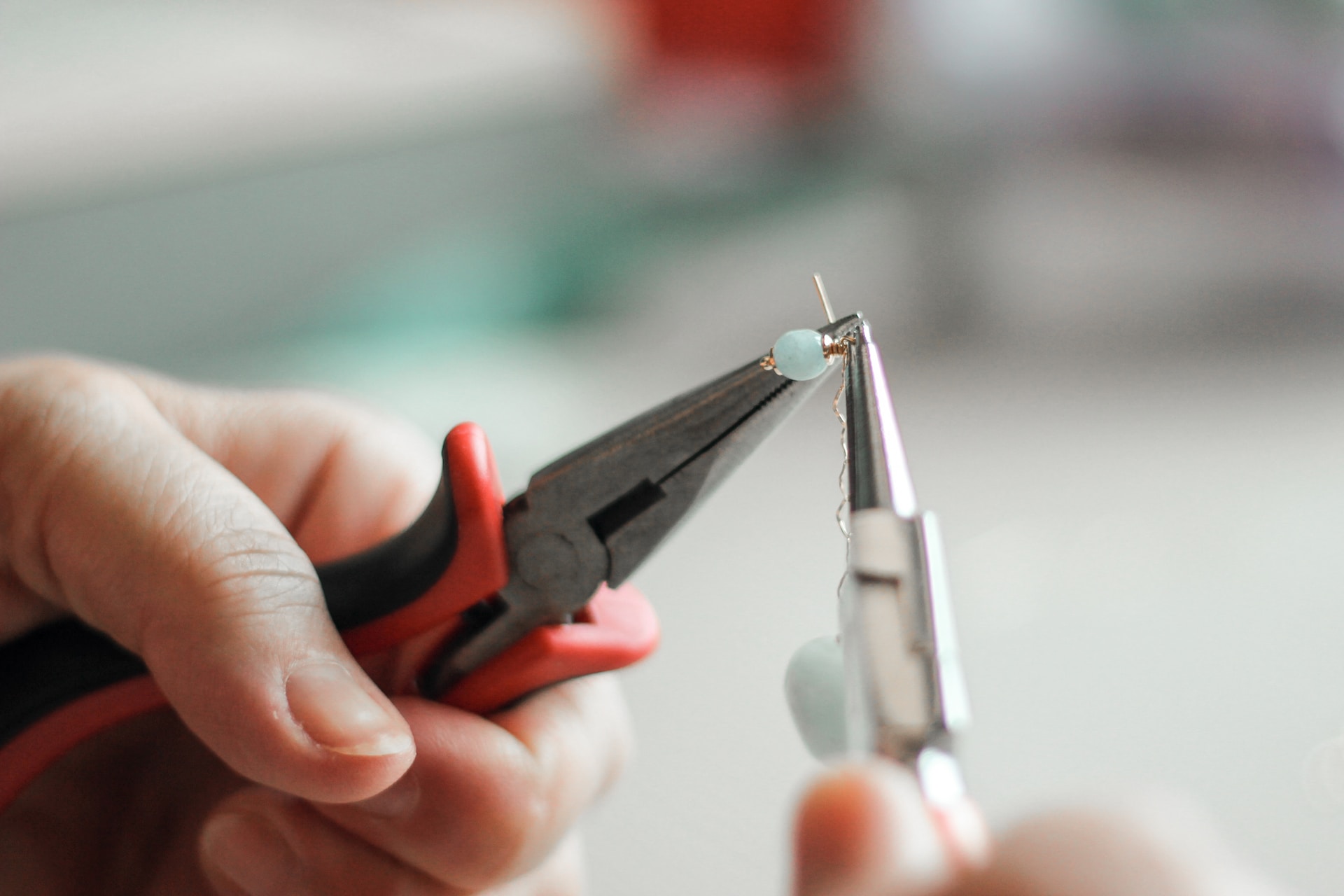 pliers being used in jewelry making
